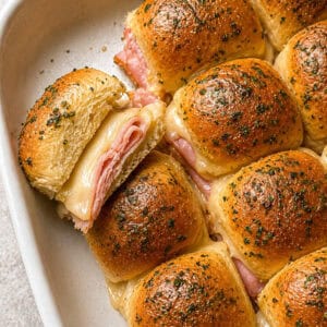 ham and swiss sliders recipe - buttery dinner rolls filled with ham and swiss cheese.
