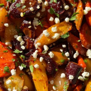 Roasted root vegetable medley with feta cheese and fresh herbs.